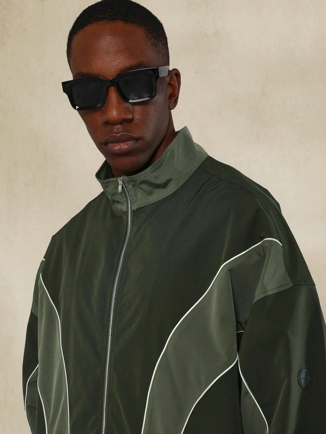 Colour Blocking Nylon Zip Through Track Jacket With Reflective Piping Detail