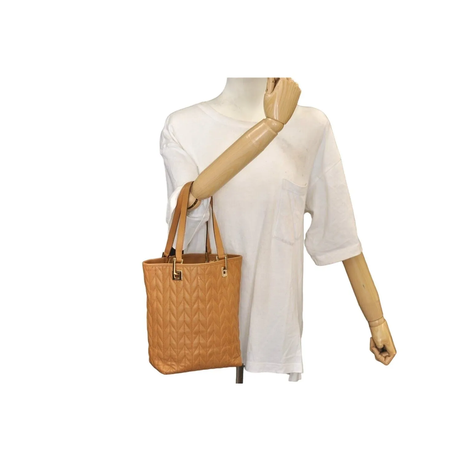 Gucci quilted camel leather, medium sized, two strap tote with bold chrome hardware