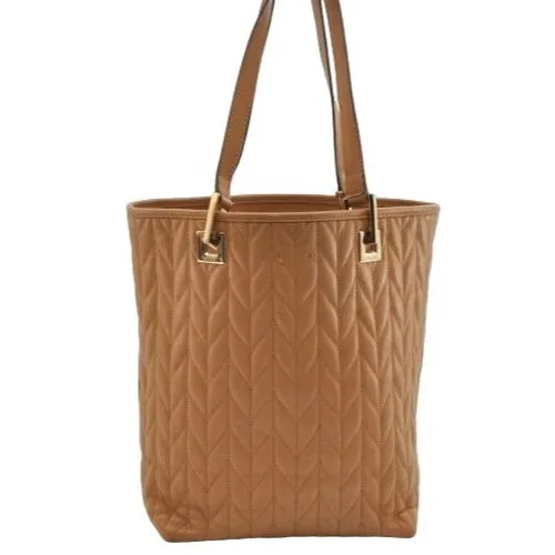 Gucci quilted camel leather, medium sized, two strap tote with bold chrome hardware